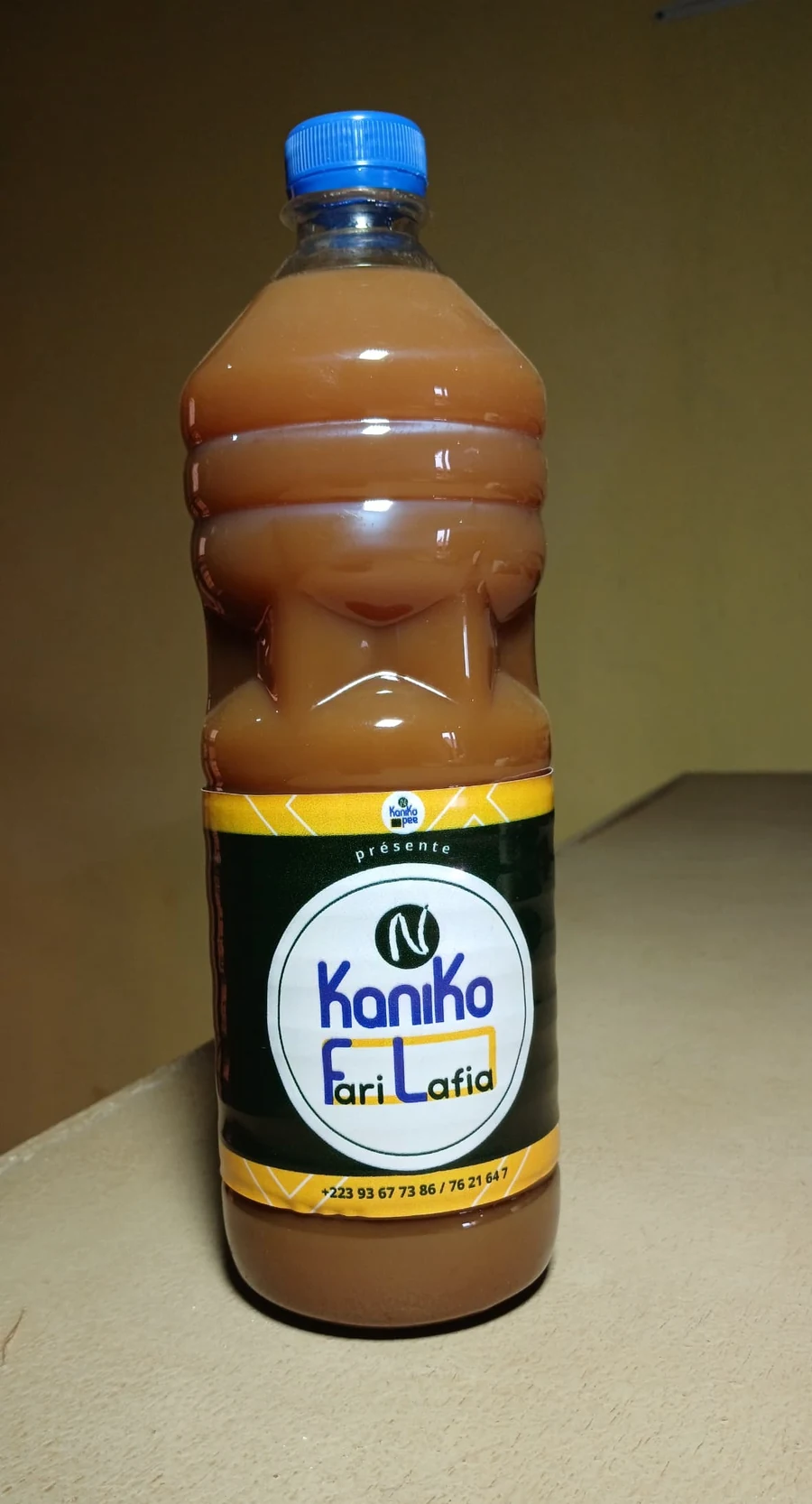 Bouteille réelle de N'Kaniko Fari Lafia, vue de face, numéros imprimés visibles